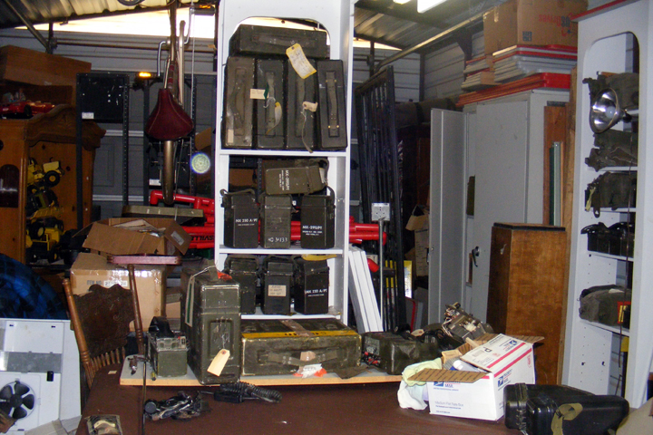 storage building of just a small amount of more Signal Corps SB-22/PT switchboard and field telephones